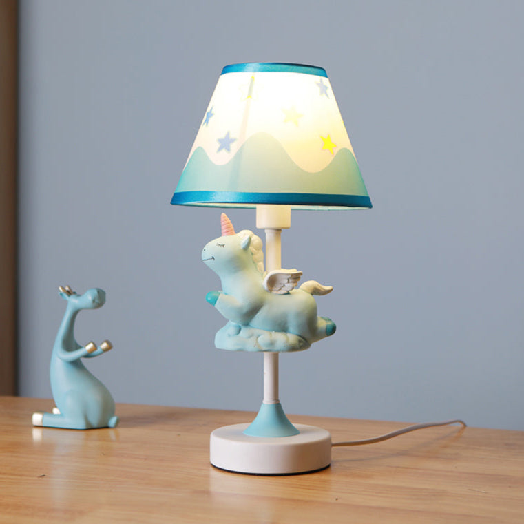 Twinkle Horn – A unicorn table lamp with a fabric shade, perfect for a study room