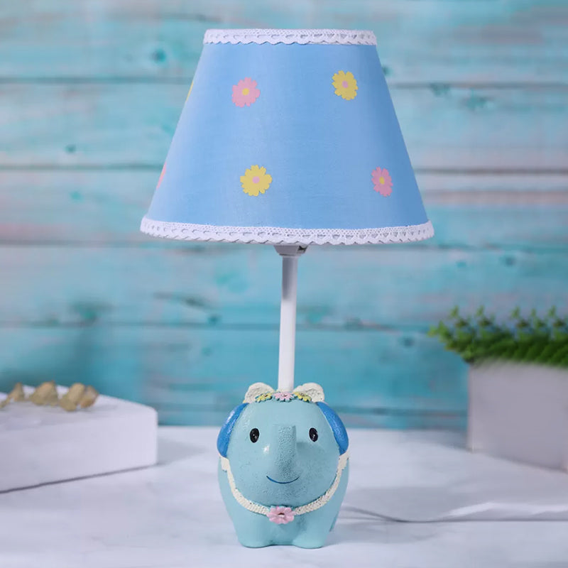 Elebloom – A children’s table lamp with a floral pattern and elephant base.
