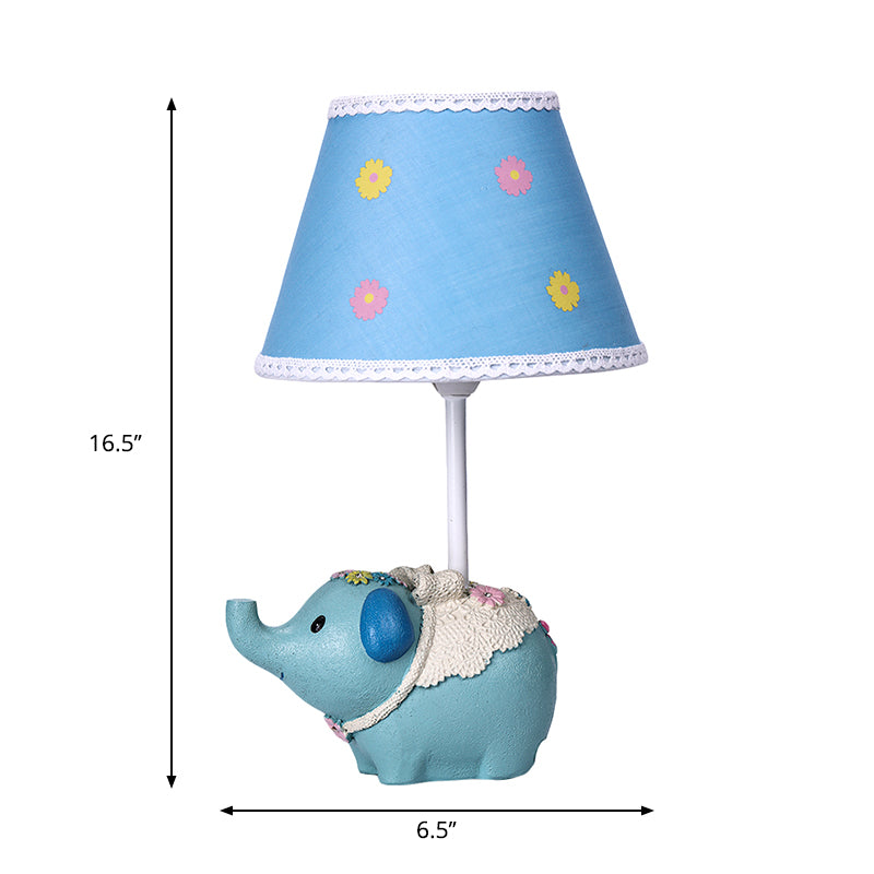 Elebloom – A children’s table lamp with a floral pattern and elephant base.
