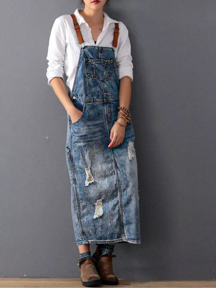 My Denim | A worn-out denim overall dress with a back slit