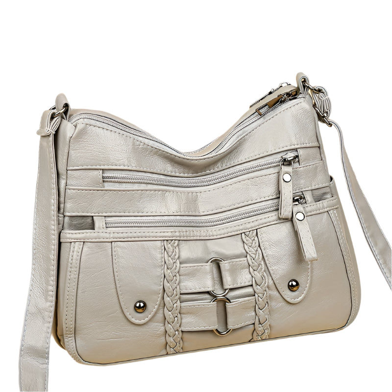 モーリーン - 調節可能なショルダーストラップ付きのモダンなマルチジップバッグ