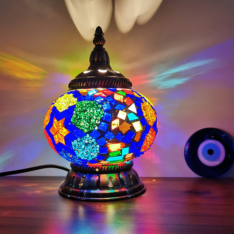 Globera – an intricately crafted spherical colored glass lamp