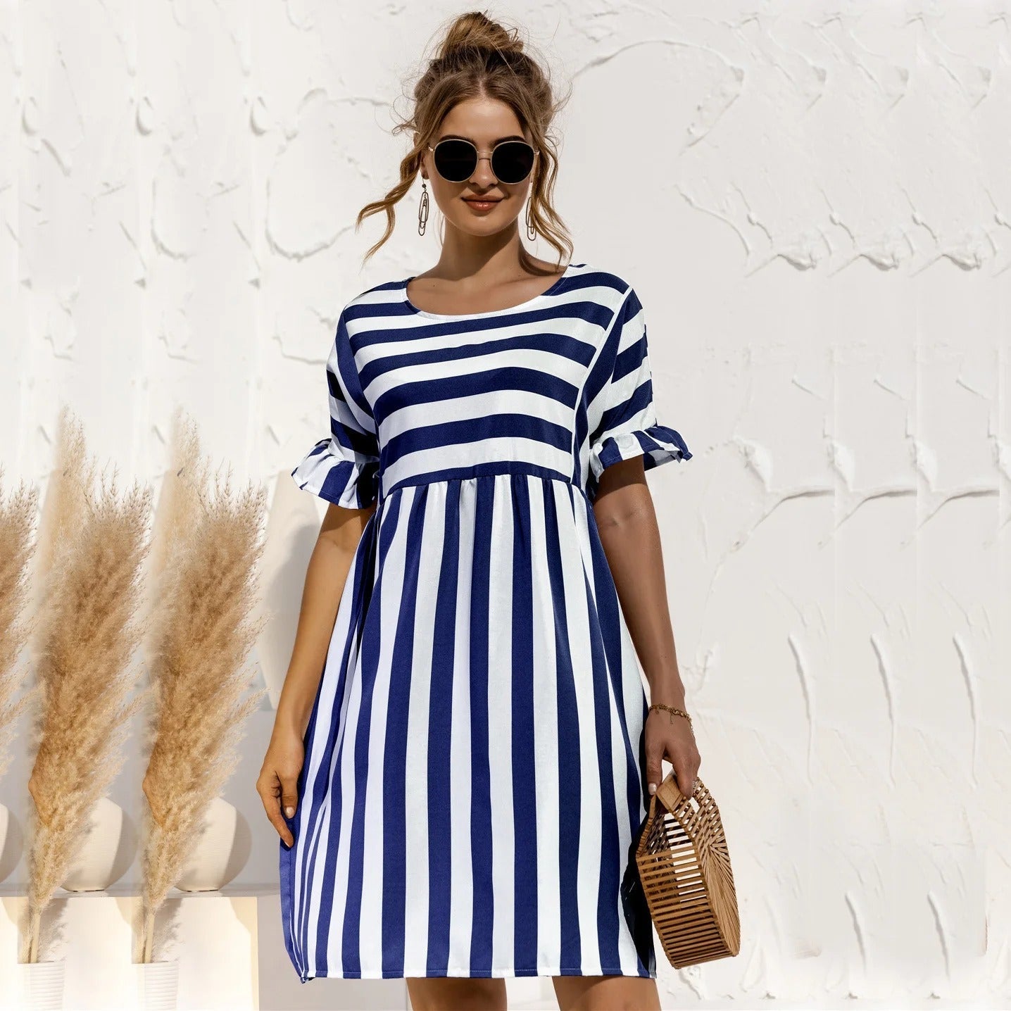 Livia - Elegant striped print dress with voluminous ruffles