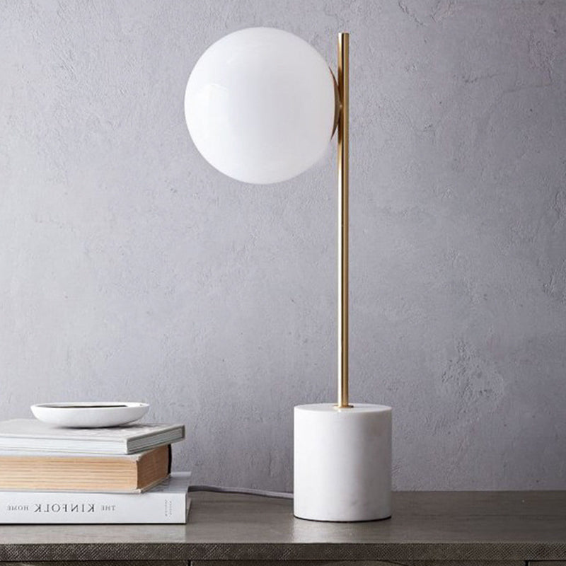 Modern white glass spherical table lamp with Aurelia marble base