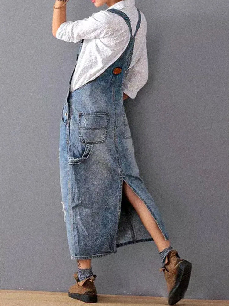 My Denim | A worn-out denim overall dress with a back slit