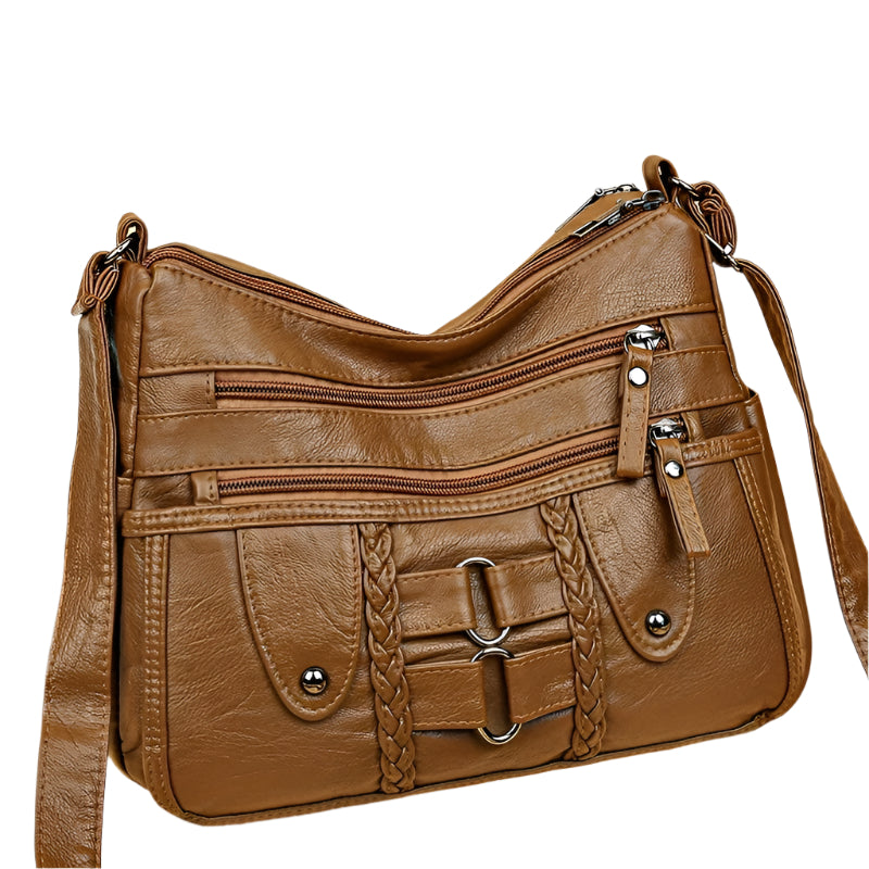 モーリーン - 調節可能なショルダーストラップ付きのモダンなマルチジップバッグ