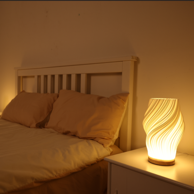 Bellarme - A reliable table lamp with a wavy shade design