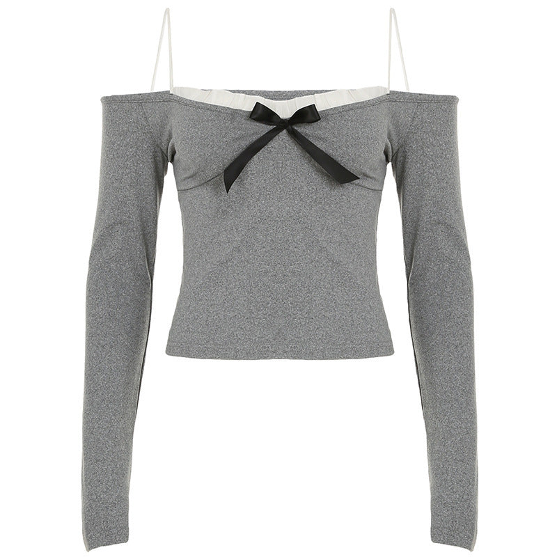 リタ - フリルとリボンが付いたオフショルダーの長袖シャツ