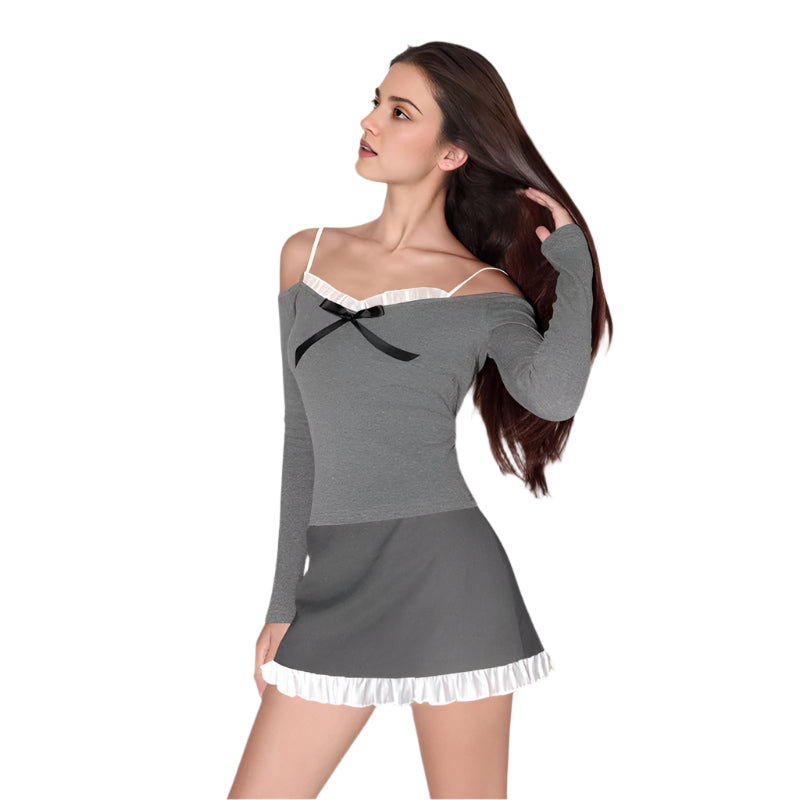 リタ - フリルとリボンが付いたオフショルダーの長袖シャツ