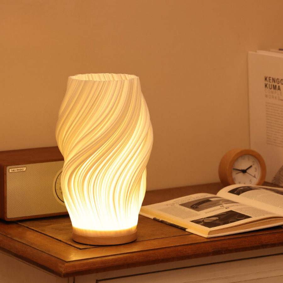Bellarme - A reliable table lamp with a wavy shade design