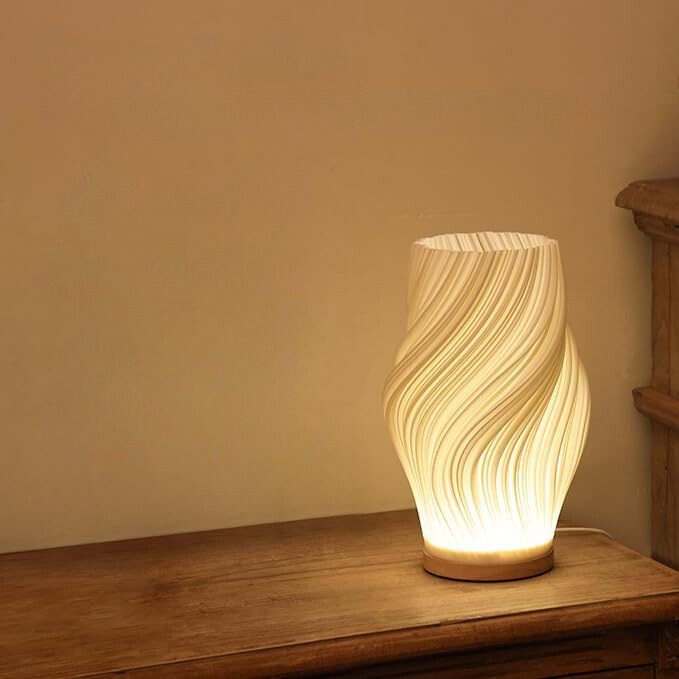 Bellarme - A reliable table lamp with a wavy shade design