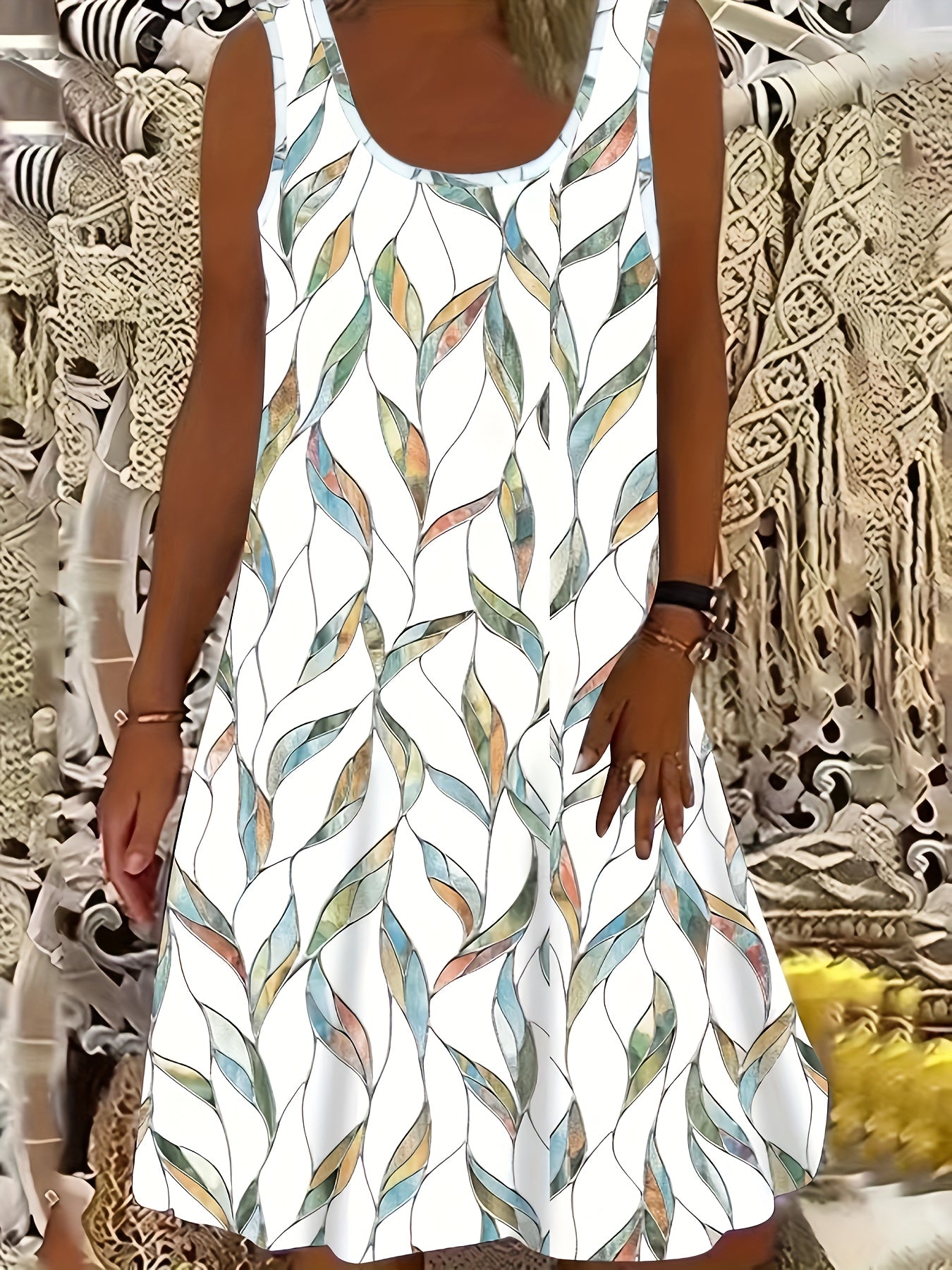 Clara - Modern sleeveless dress with leaf pattern