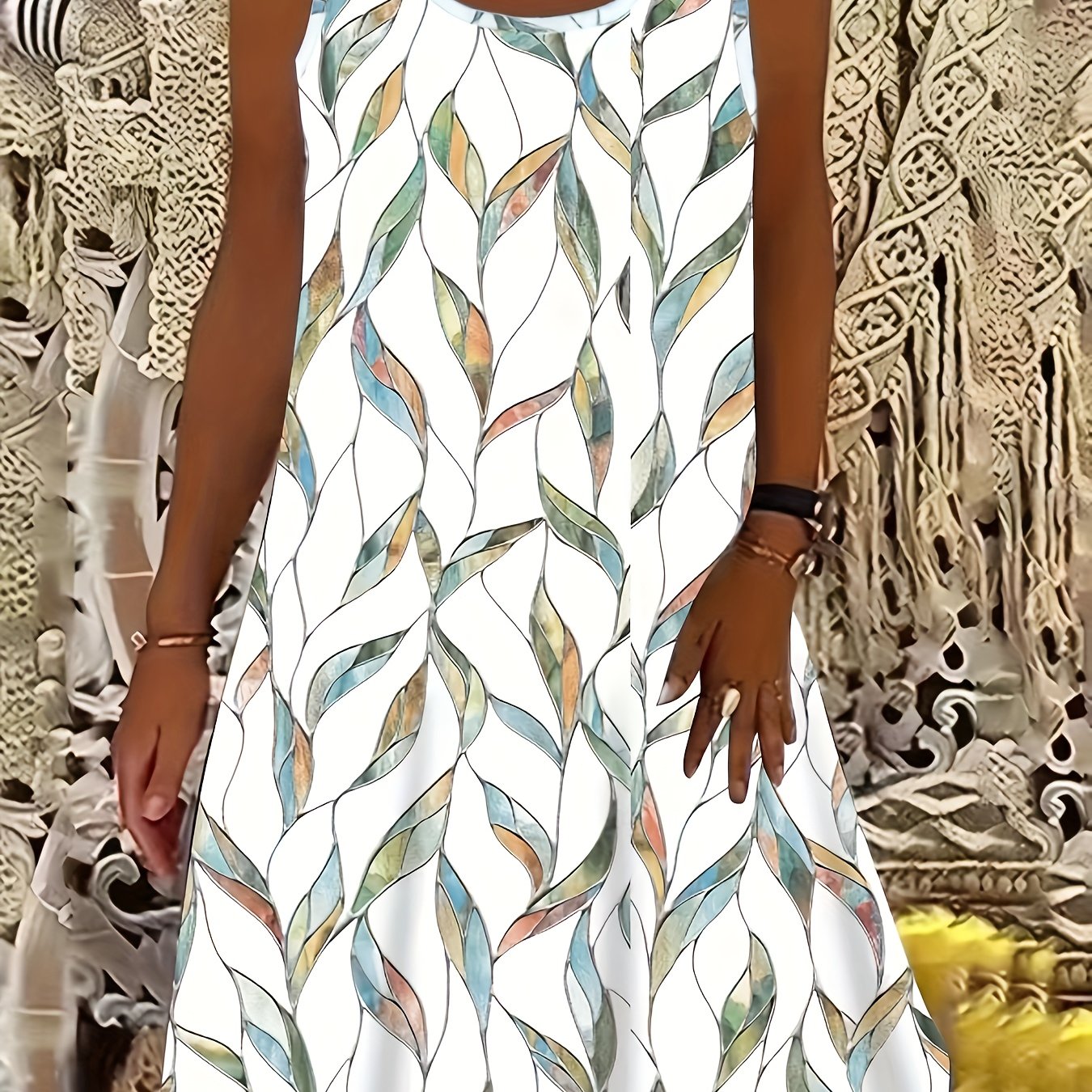 Clara - Modern sleeveless dress with leaf pattern