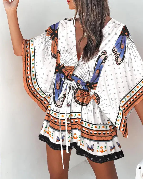 Nia - Loose-fitting butterfly mini dress